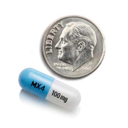 Capsule and dime image